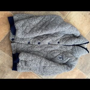 Frosted blue full Sherpa suit. Says kith on back.